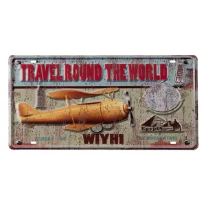 Produkt Nástěnná kovová cedule s letadlem Travel Round - 22*42 cm Clayre & Eef